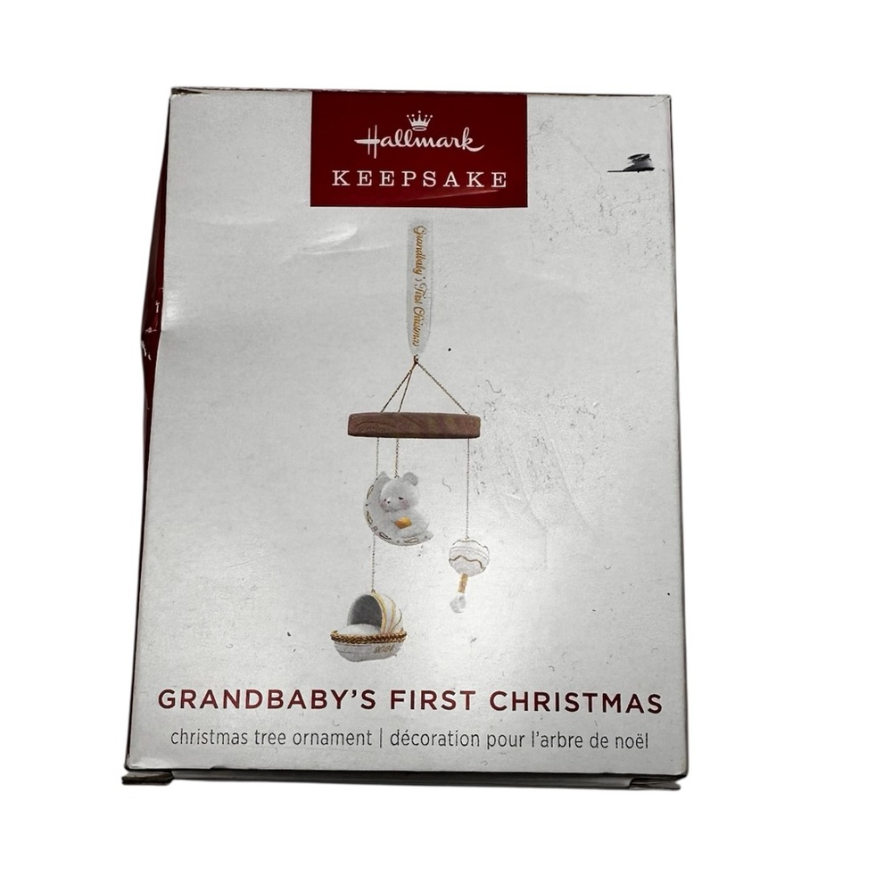Hallmark Keepsake Ornament. “Grandbaby’s first Christmas”. Porcelain and wood.